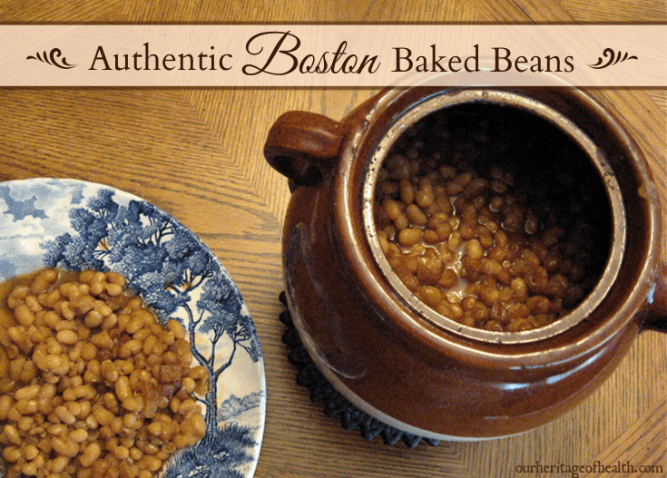 Boston baked beans in bean pot with blue plate of beans on the side.