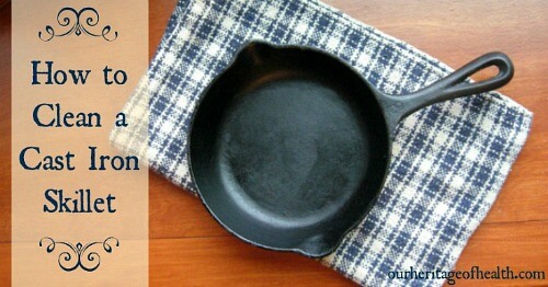 Cast iron skillet on a blue checked cloth.