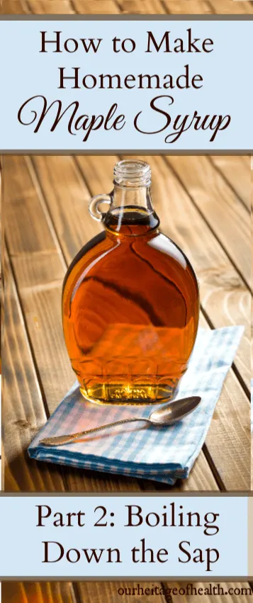 A bottle of maple syrup on a blue gingham towel with a spoon.
