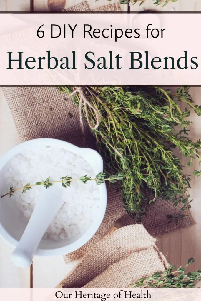 White mortar and pestle filled with salt with sprigs of thyme around it on a table with a text overlay that says "6 DIY Recipes for Herbal Salt Blends."