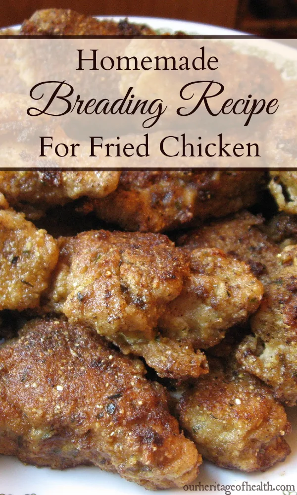 Fried chicken coated in homemade breading mixture on a plate.